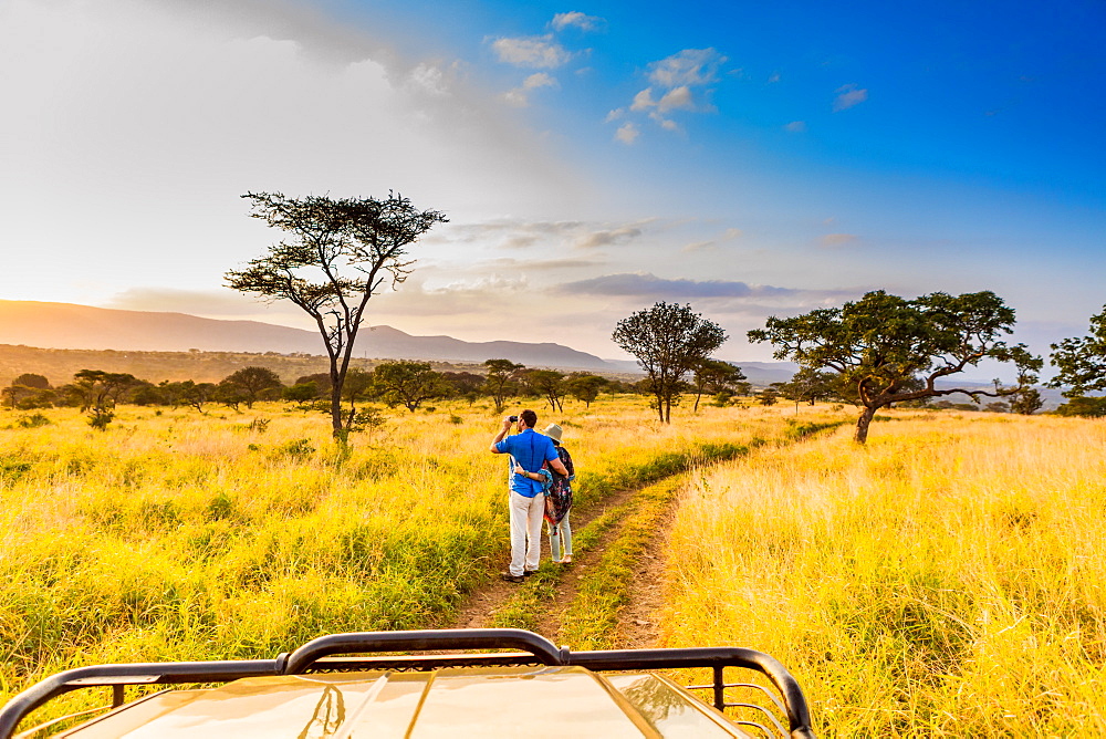 Couple enjoying view at a safari camp, Zululand, South Africa, Africa