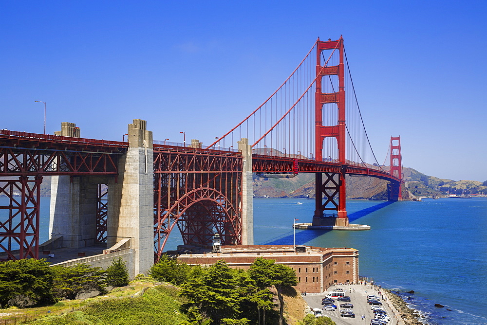 Looking across the San Francisco Golden Gate Bridge with Fort George in the foreground at the edge of the Pacific Ocean, California, United States of America, North America