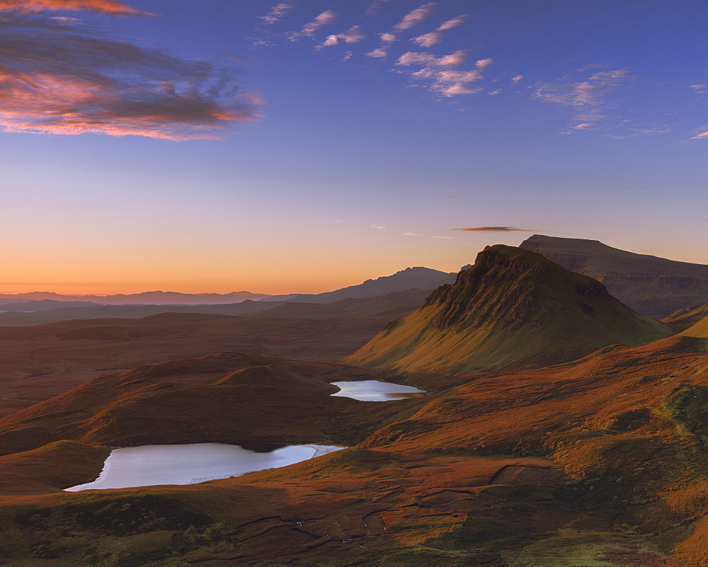 Looking south along the Trotternish peninsula to Cleat with the sun raking across the landscape on the Isle of Skye, Inner Hebrides, Scotland, United Kingdom, Europe