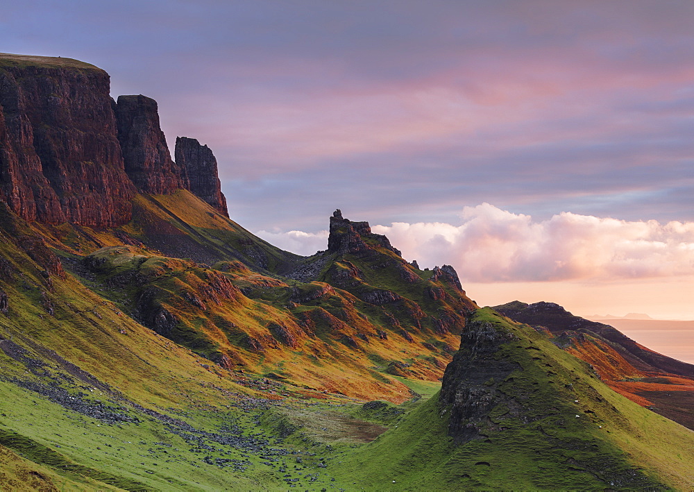 Early morning dawn light hits the Quiraing in the Trotternish peninsula on the Isle of Skye, Inner Hebrides, Scotland, United Kingdom, Europe