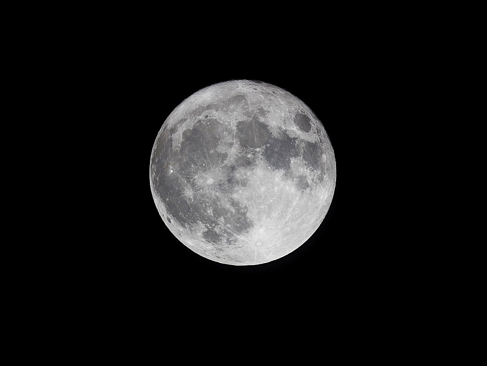 Supermoon (perigree full moon) bigger and brighter in the winter evening sky, United Kingdom, Europe