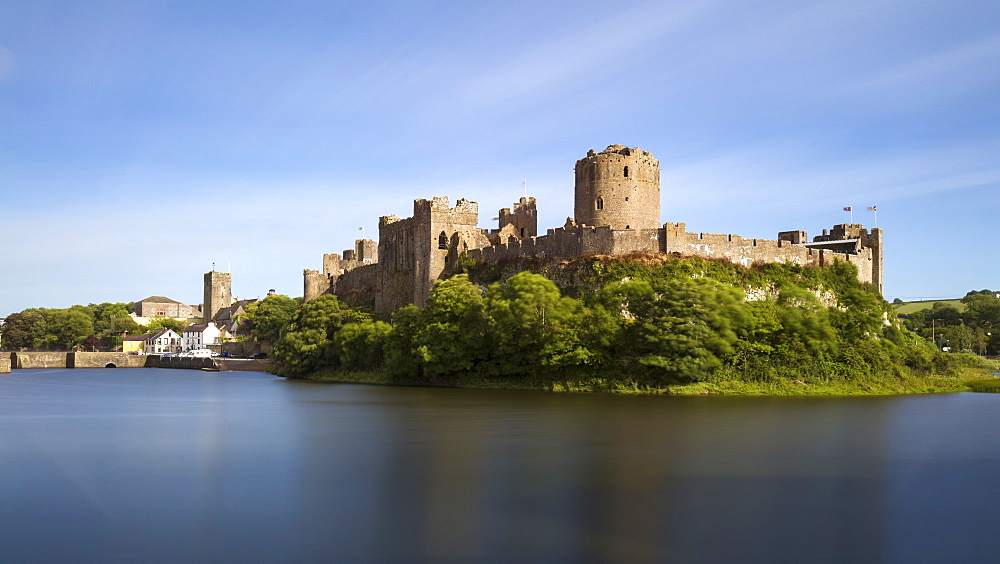 Pembroke Castle and town walls on a summers evening, Pembroke, Wales, United Kingdom, Europe