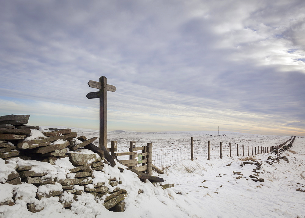 Looking across snow covered fields in the Peak District to the Cat and Fiddle Inn in the White Peak, Cheshire, England, United Kingdom, Europe