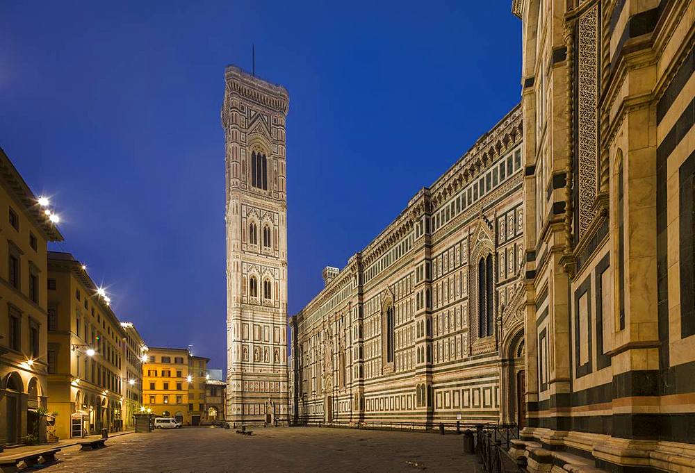 A deserted Piazza Del Duomo extends alongside the Cathedral (Duomo) to the Campanile in the early morning, Florence, UNESCO World Heritage Site, Tuscany, Italy, Europe