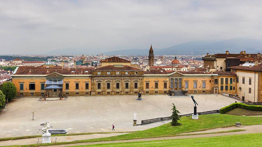 Looking to the west wing of the Palazzo Pitti and beyond to the centre of Florence from the Boboli Gardens, Florence, Tuscany, Italy, Europe