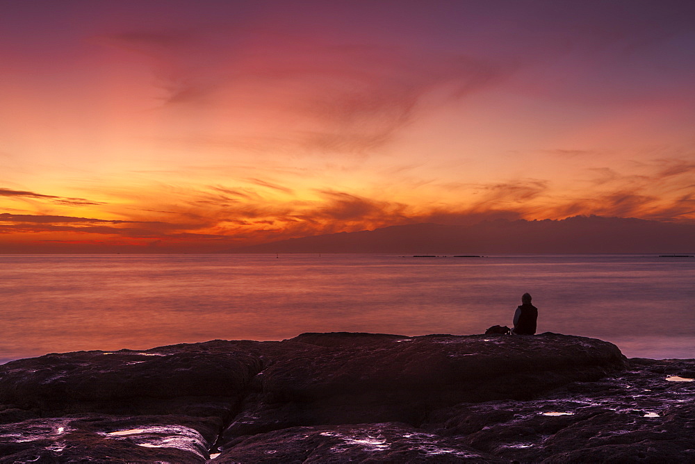 Watching sunset from the western shore of Tenerife in the Canary Islands, Spain, Atlantic, Europe