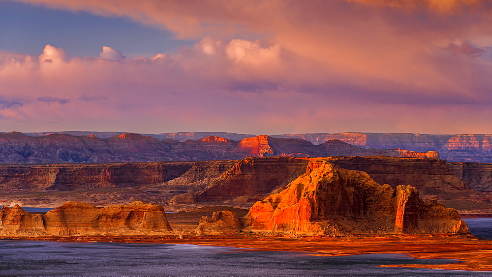 Sunset illuminates the rugged mountainous outcrops of Grand Staircase-Escalante National Monument, Arizona, United States of America, North America