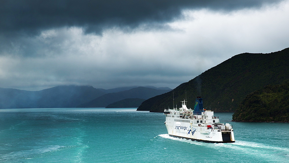 A ferry heads along Queen Charlotte sound for the Cook Straits on a journey from Picton to Wellington, New Zealand, Pacific