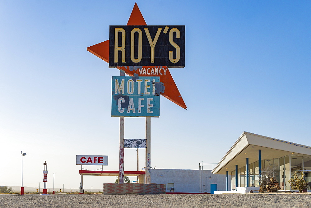 A classic retro looking sign for a gas station, motel and cafe along the historical Route 66 in the Mojave Desert, California, United States of America, North America