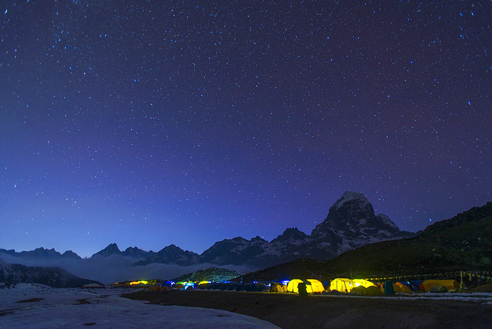 Ama Dablam base camp in the Everest region glows at twilight, Himalayas, Nepal, Asia