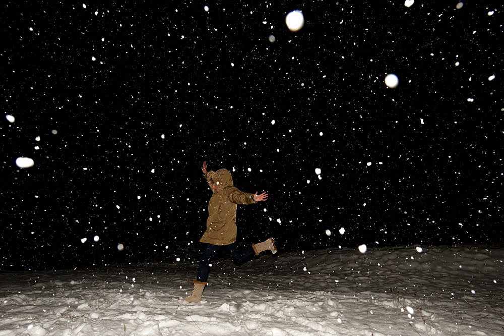 Snowfall at night lit up by a flashgun, Falcade, The Dolomites, Italy, Europe