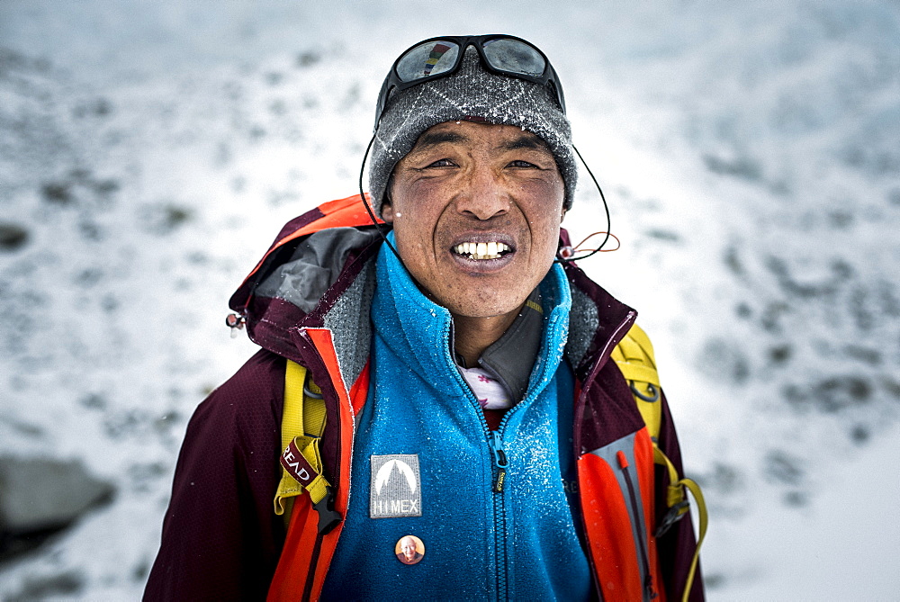 A Sherpa working at Everest Base Camp, Khumbu Region, Nepal, Asia