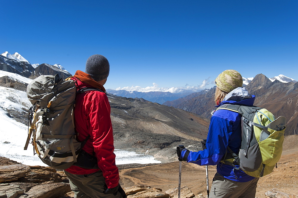 Admiring the view from the top of the Kagmara La, the highest point in the Kagmara Valley at 5115m in Dolpa, Himalayas, Nepal, Asia