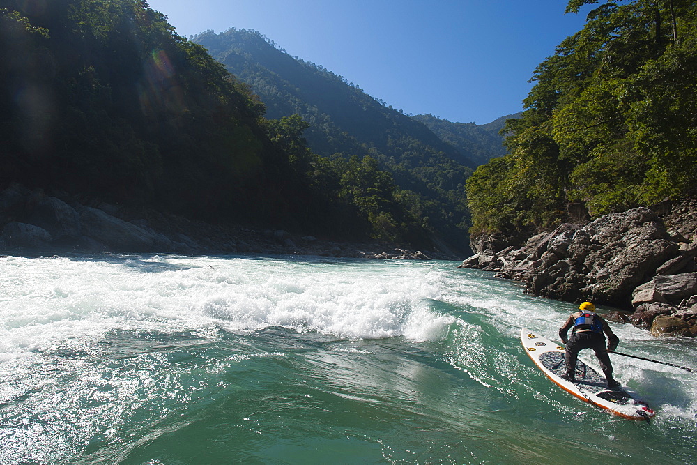 Stand Up Paddleboarding on the Karnali River, Nepal, Asia