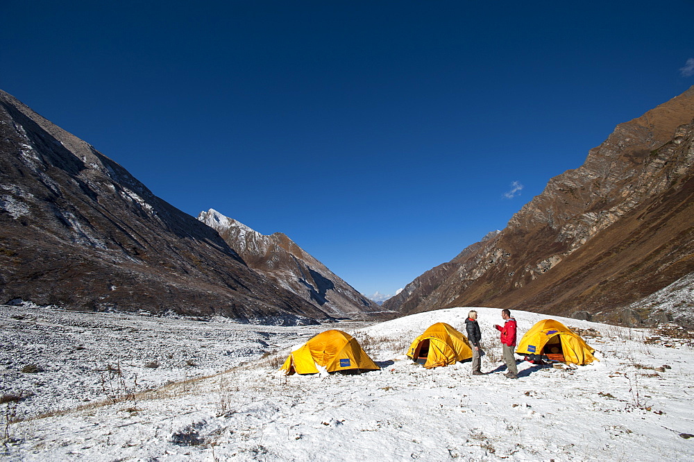 A hot cup of tea is the first thing needed after a chilly night at Kagmara Phedi in the little explored Kagmara valley, Dolpa Region, Himalayas, Nepal, Asia