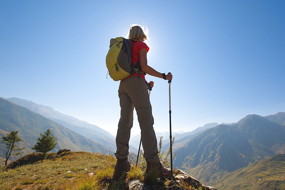 Taking a pause from the trail at a viewpoint in the Juphal valley in the remote Dolpa region, Himalayas, Nepal, Asia