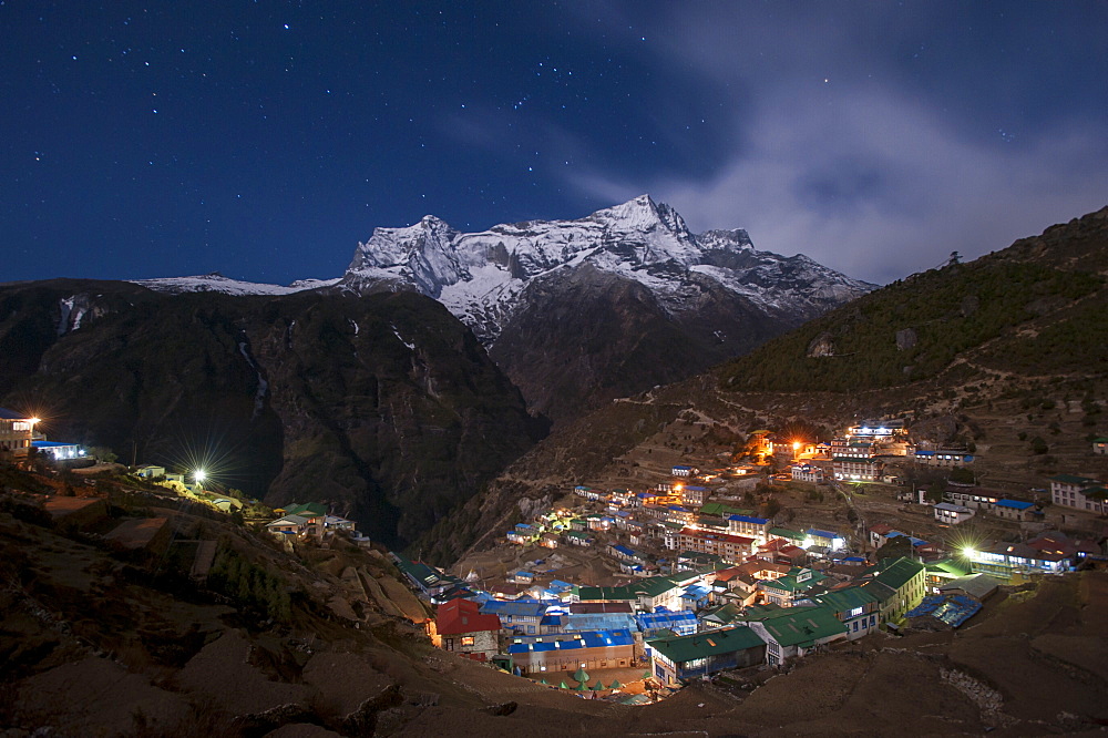 Spectacular Namche Bazaar lit up at night, in the Everest region, Himalayas, Nepal, Asia