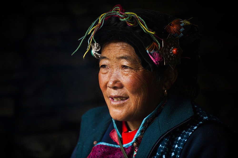 A Tibetan woman in Champing Valley, Sichuan, China, Asia