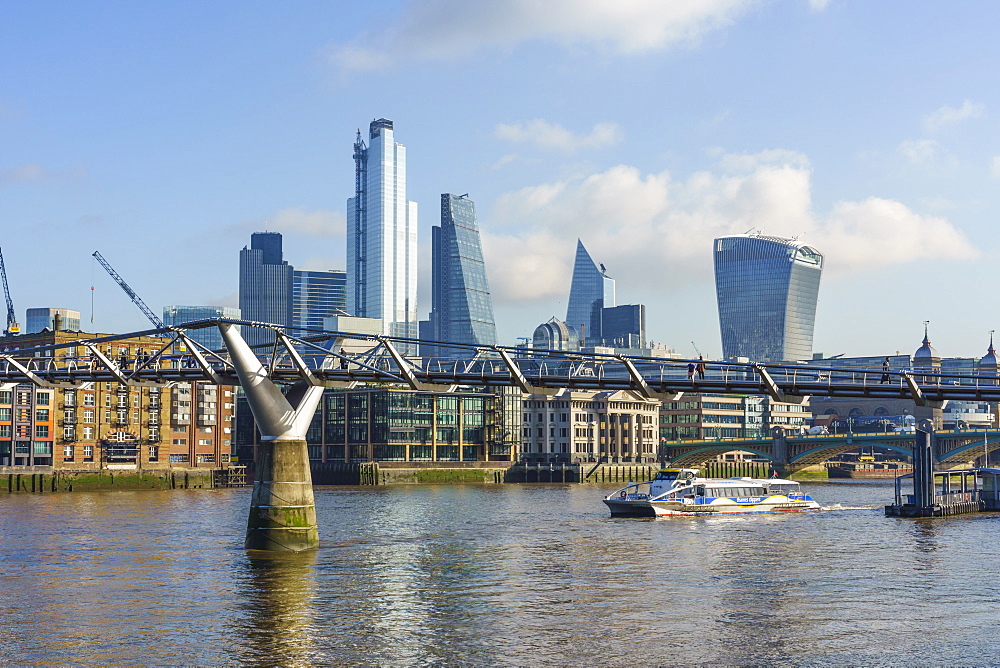 City of London skyscrapers with Millennium Bridge and River Thames, London, England, United Kingdom, Europe