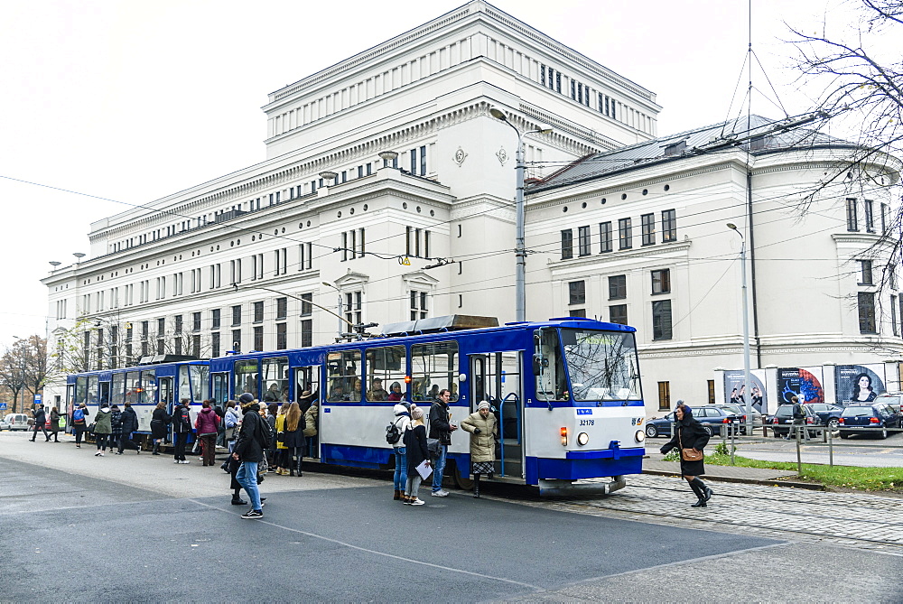 Tram outside Latvian National Opera picking up passengers, UNESCO World Heritage Site, Riga, Latvia, Europe