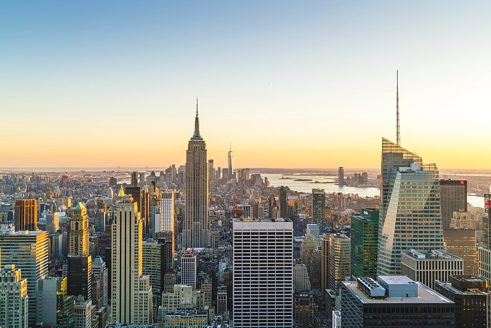 Manhattan skyline and Empire State Building, sunset, New York City, United States of America, North America