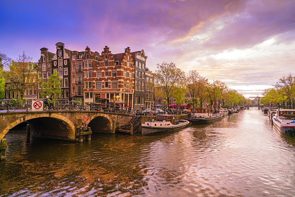 Canal scene at dusk, Amsterdam, Netherlands, Europe