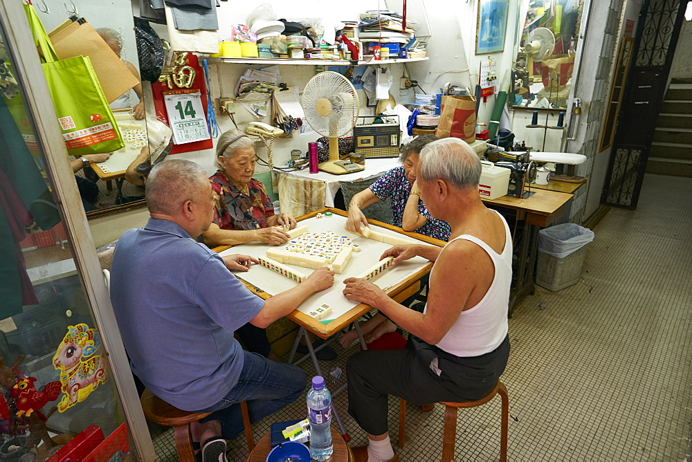 Elderly couples playing Mahjong, Hong Kong, China, Asia