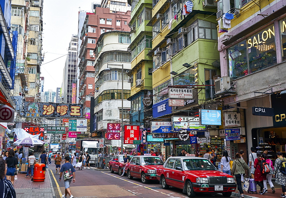 A busy street in Mong Kok (Mongkok), Kowloon, Hong Kong, China, Asia