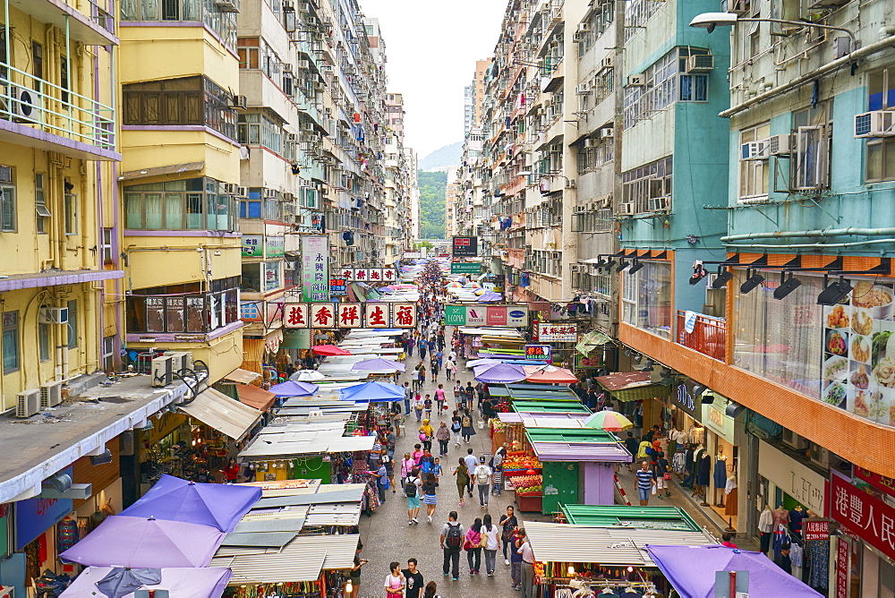 A busy market street in Mong Kok (Mongkok), Kowloon, Hong Kong, China, Asia