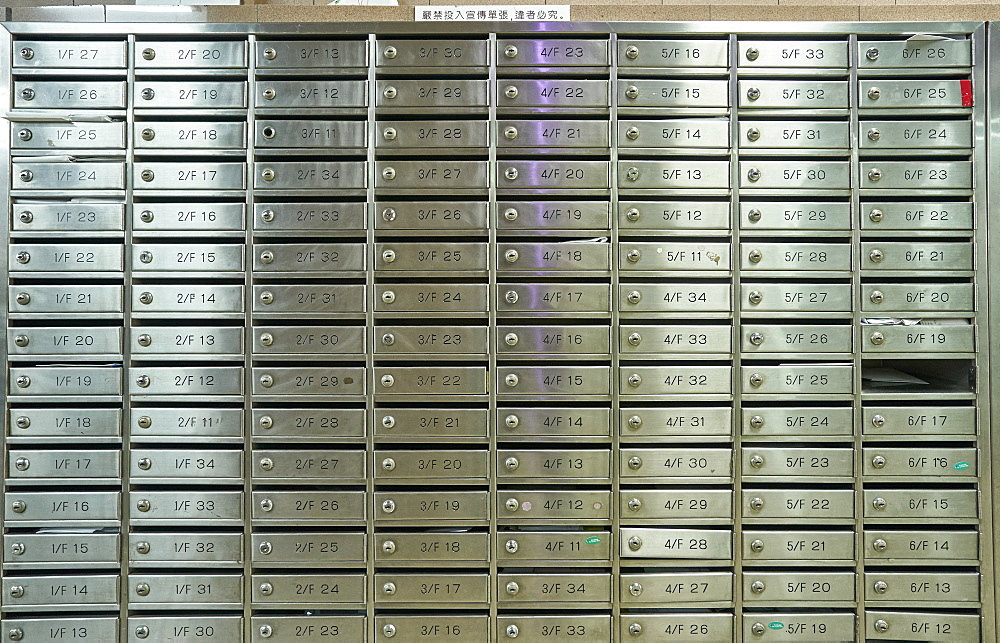 Post boxes in the foyer of an apartment building, Hong Kong, China, Asia