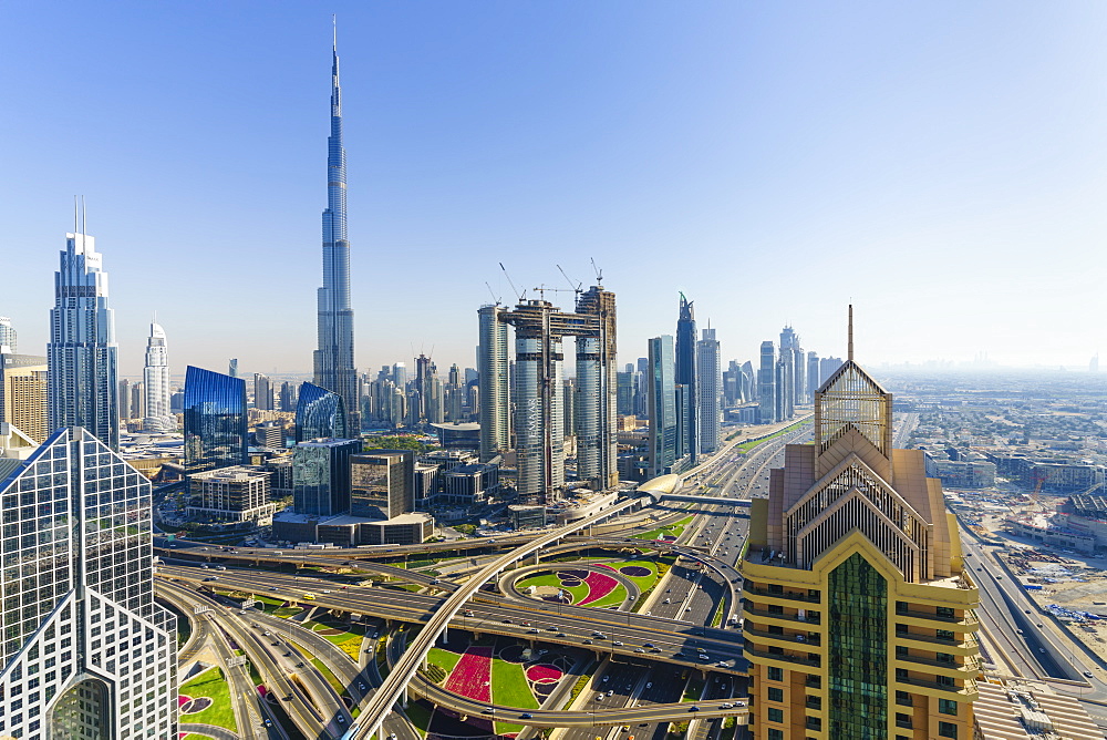 Dubai skyline and Sheikh Zayed Road Interchange, Dubai, United Arab Emirates, Middle East