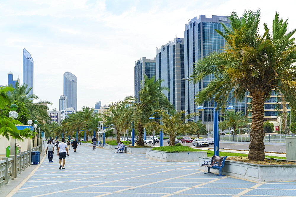 Joggers on the Corniche, Abu Dhabi, United Arab Emirates, Middle East