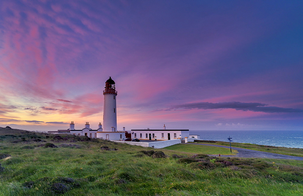 Mid-summer sunrise over The Mull of Galloway Lighthouse, Galloway, Scotland, United Kingdom, Europe