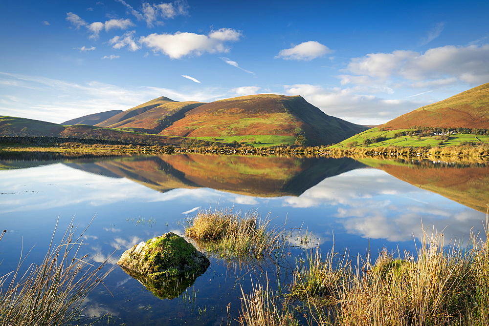 Skiddaw reflected in Tewet Tarn, Keswick, Lake District National Park, UNESCO World Heritage Site, Cumbria, England, United Kingdom, Europe