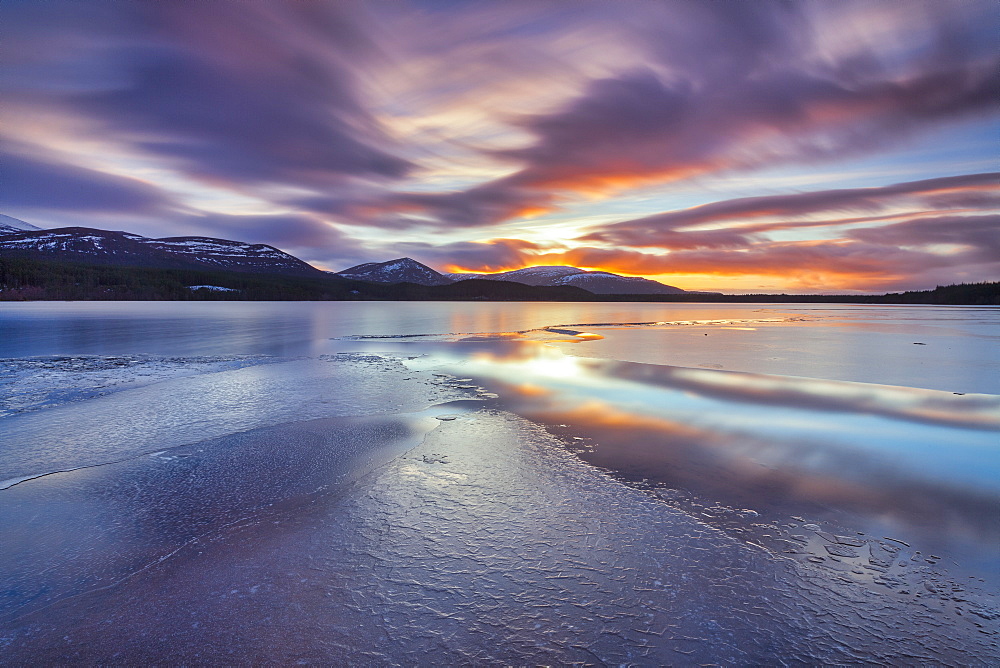 Ice sheets and sunset at Loch Morlich, Glenmore, Scotland, United Kingdom, Europe