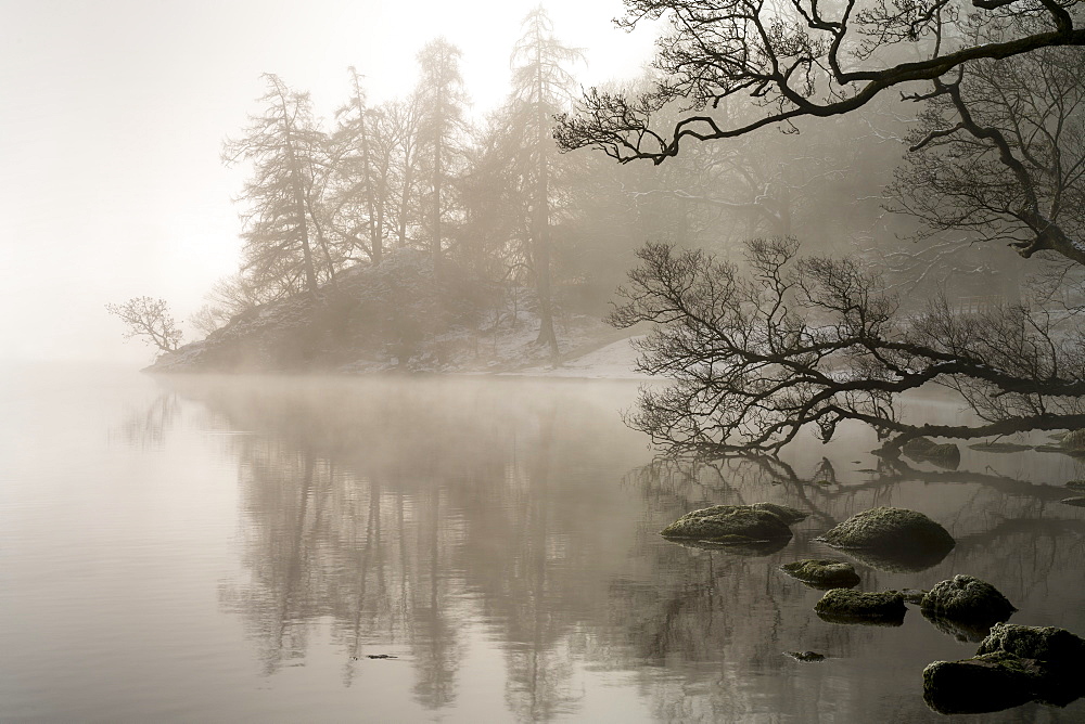 Mid-winter mist over Ullswater, Lake District National Park, UNESCO World Heritage Site, Cumbria, England, United Kingdom, Europe