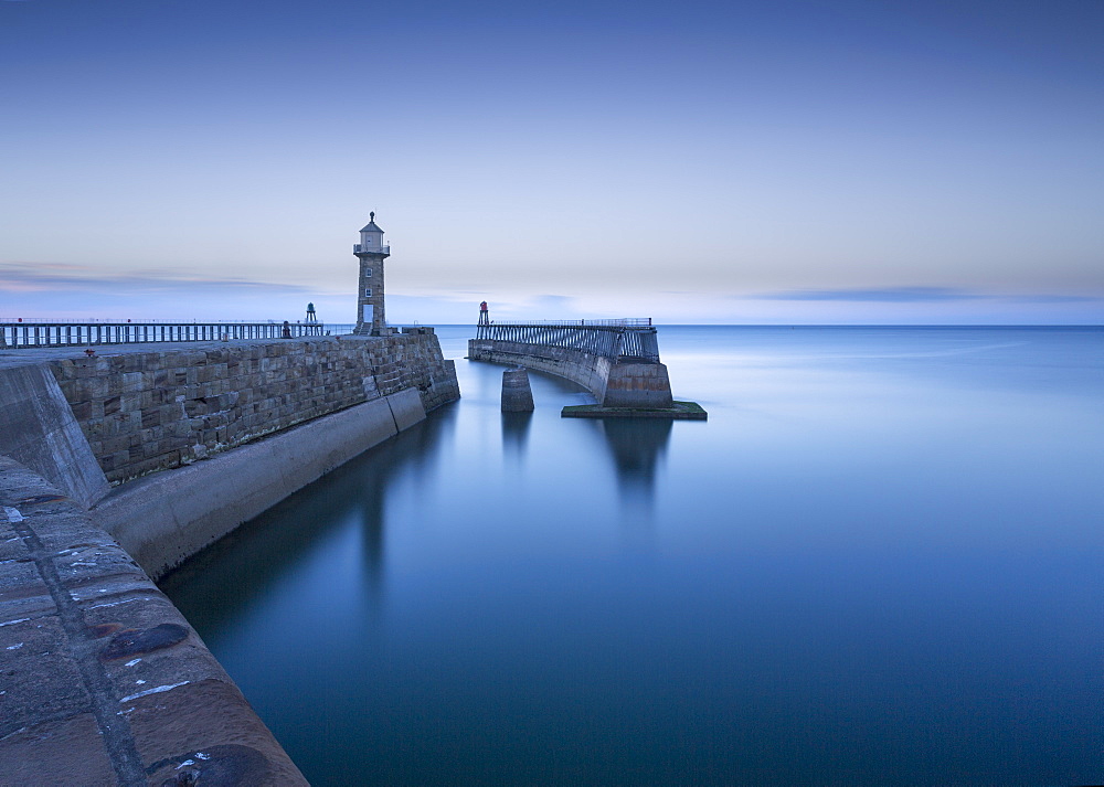 Whitby piers and lighthouses, shortly after sunset, Whitby, North Yorkshire, England, United Kingdom, Europe