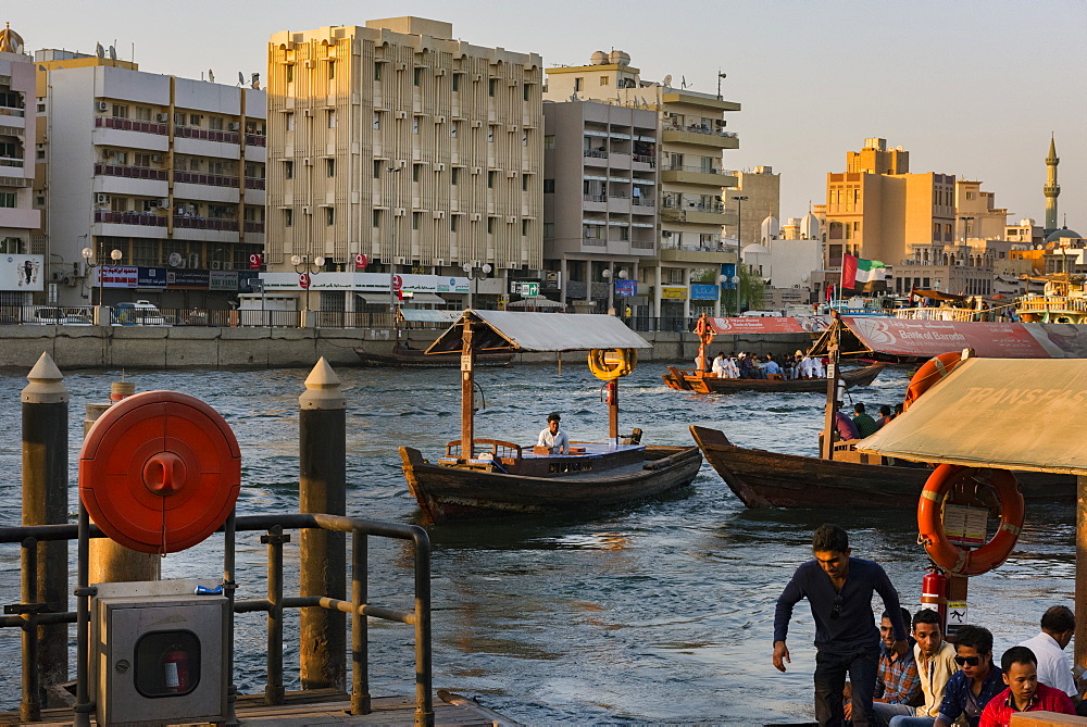 Water taxis carry passengers across Dubai Creek, Dubai, United Arab Emirates, Middle East