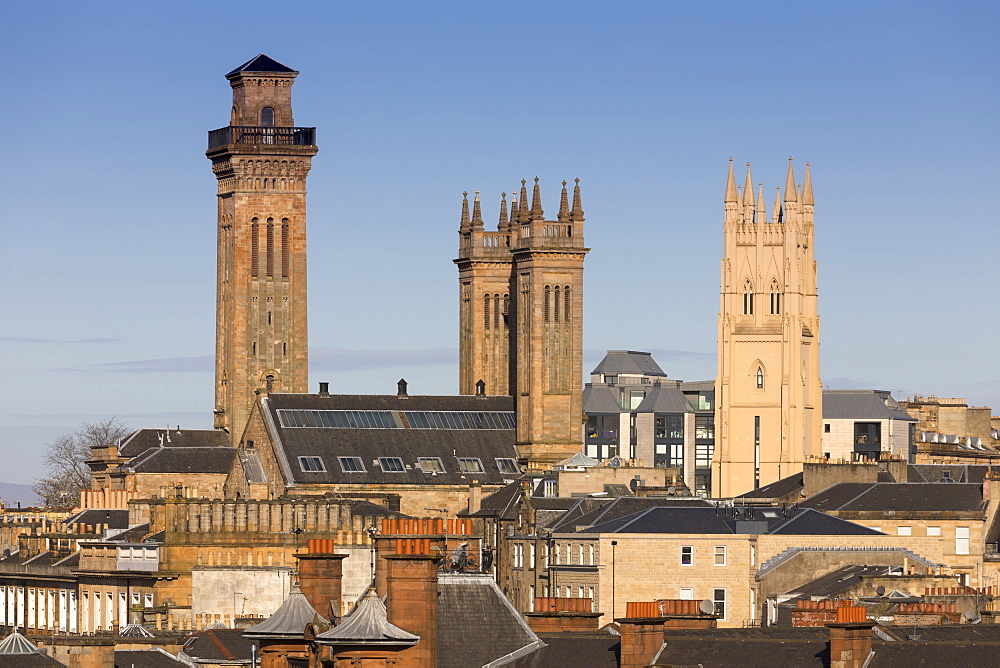 City skyline view of the towers of Trinity College and Park Church in the West End of Glasgow, Scotland, United Kingdom, Europe