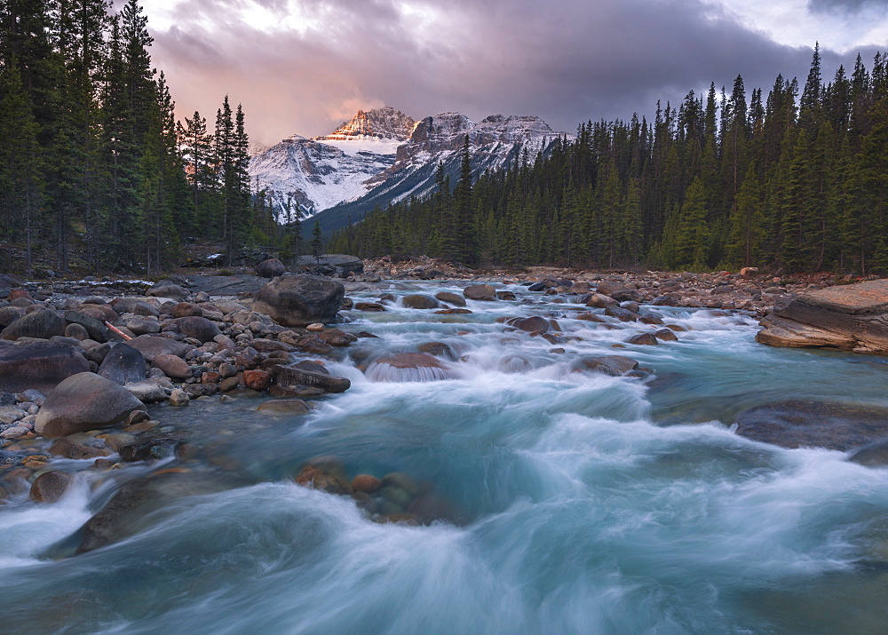 Sunrise and glacial blue rushing waters at Mistaya Canyon, Banff National Park, UNESCO World Heritage Site, Alberta, The Rockies, Canada, North America