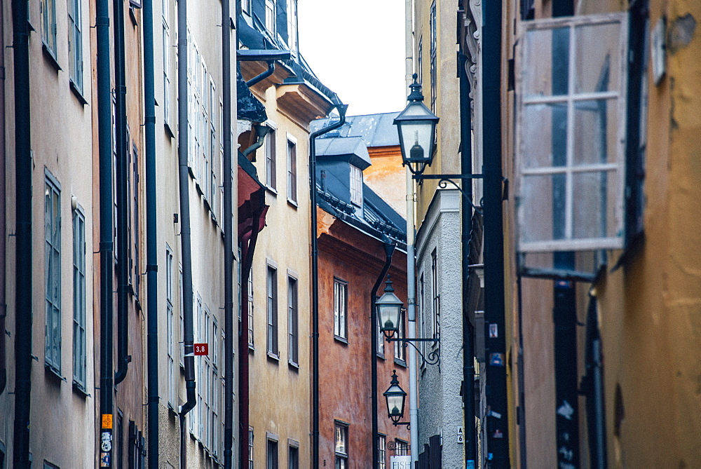 Historic and colorful buildings in Hell's Alley, Gamla Stan, Stockholm, Sweden, Scandinavia, Europe