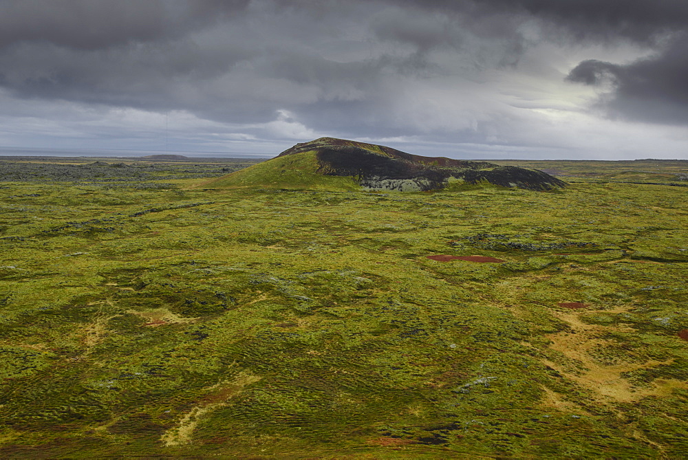 Volcanic crater and moss-covered lava fields on the Snaefellsness Peninsula, Iceland, Polar Regions