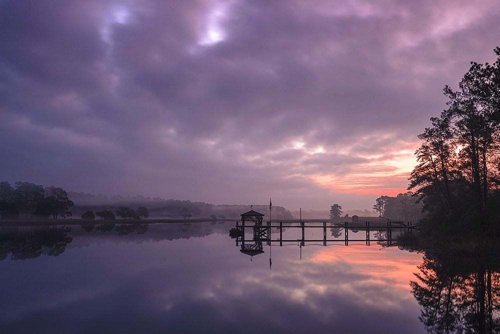 Sunrise and dock on intracoastal waterway, Calabash, North Carolina, United States of America, North America