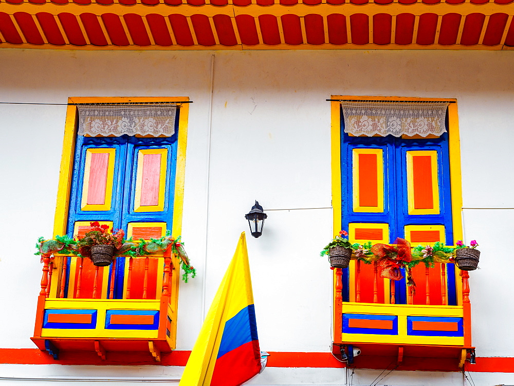 House painted in the colors of the Colombian flag (center), Filandia, Coffee Region, Colombia, South America