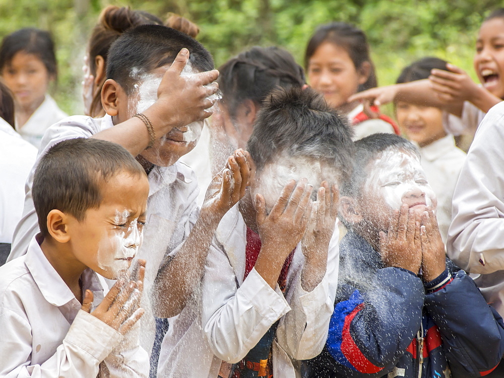 Kids at play in rural Laos, Indochina, Southeast Asia, Asia