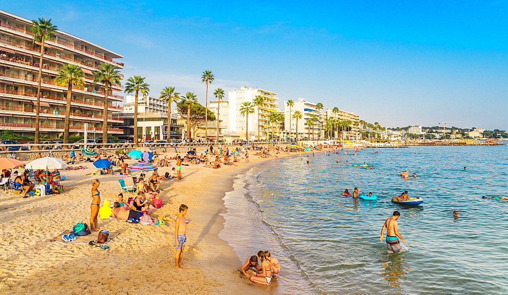 Busy beach in Juan les Pins, Cote d'Azur, Provence, France, Mediterranean, Europe