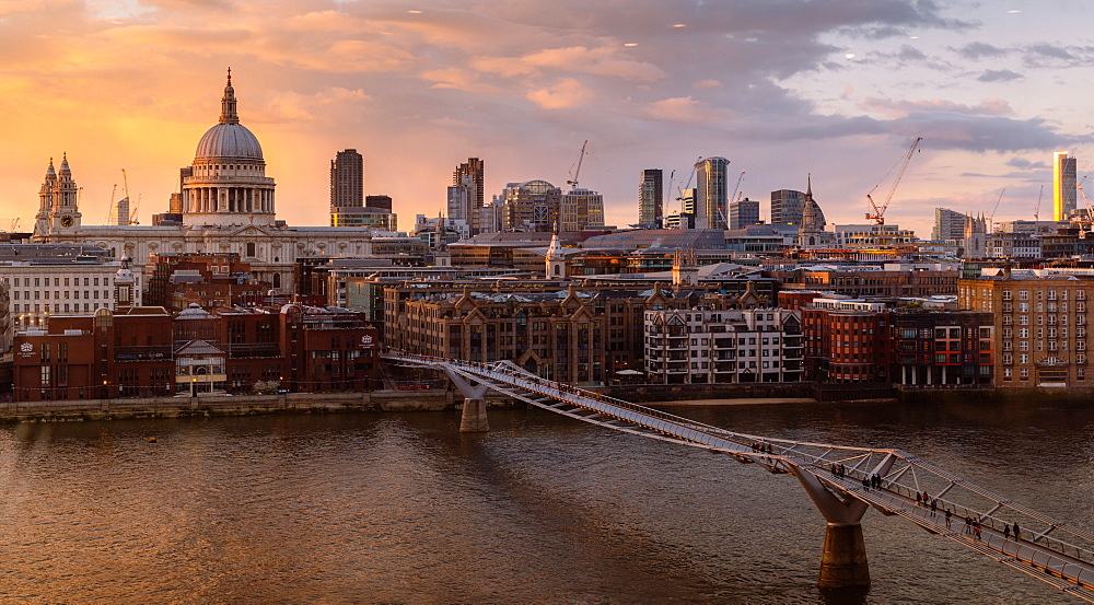 The view of the City of London from Tate Modern with the Millennium Bridge over the River Thames, and St. Paul's Cathedral, London, England, United Kingdom, Europe