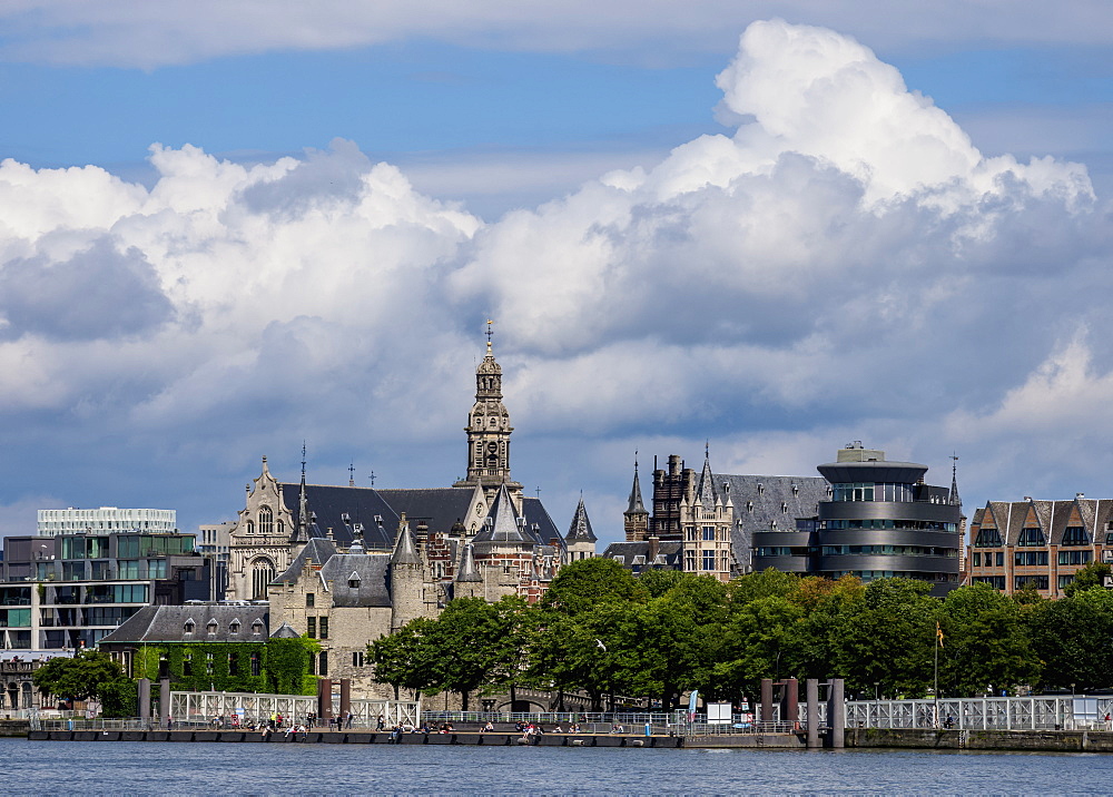 View over River Scheldt towards Het Steen Castle and Sint-Pauluskerk, Antwerp, Belgium, Europe