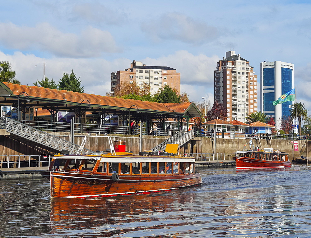 Vintage mahogany motorboats by the Fluvial Station on the Tigre River Canal, Tigre, Buenos Aires Province, Argentina, South America