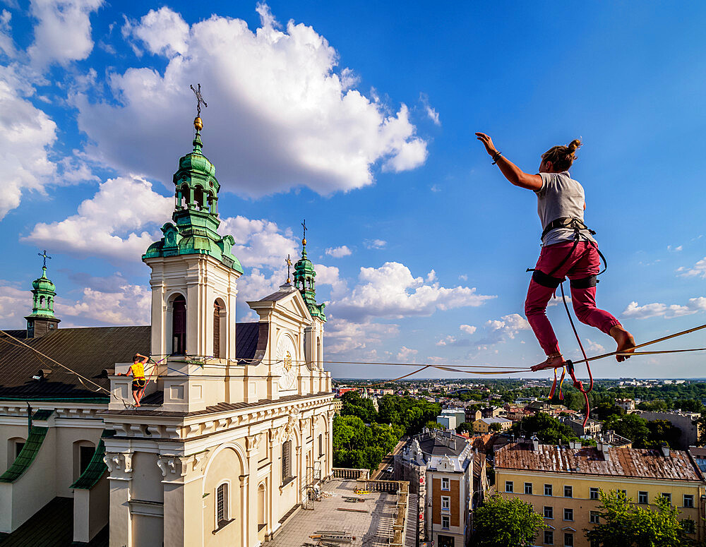 Highlining with Cathedral in the background, Urban Highline Festival, Lublin, Lublin Voivodeship, Poland, Europe